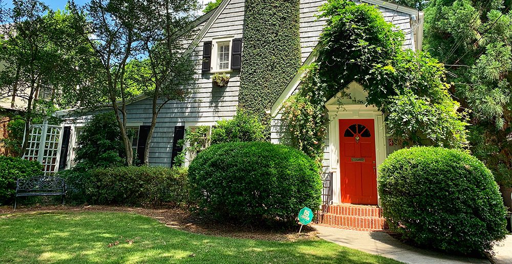 Brightly painted front door enhancing curb appeal