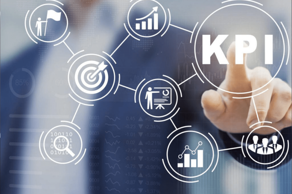 Hand touching a KPI (Key Performance Indicator) interface.