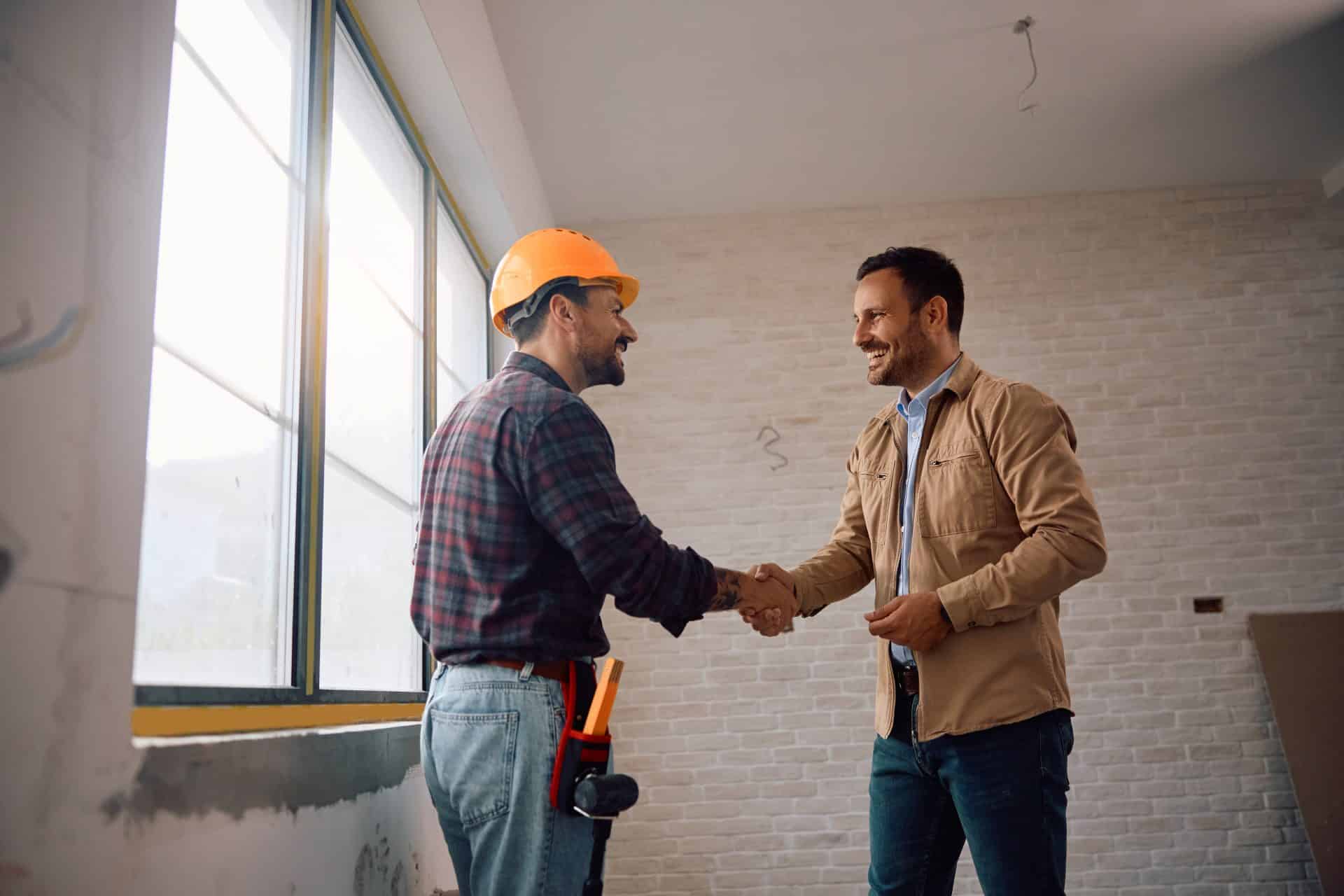 Handyman greeting homeowner – Fraser Valley