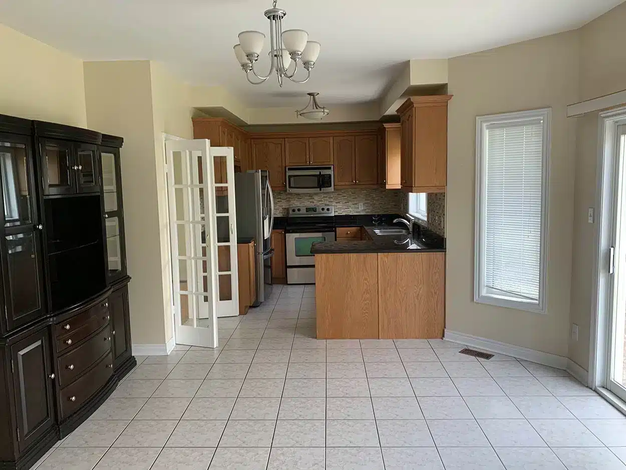 Before: dated kitchen prior to repaint — Mississauga South