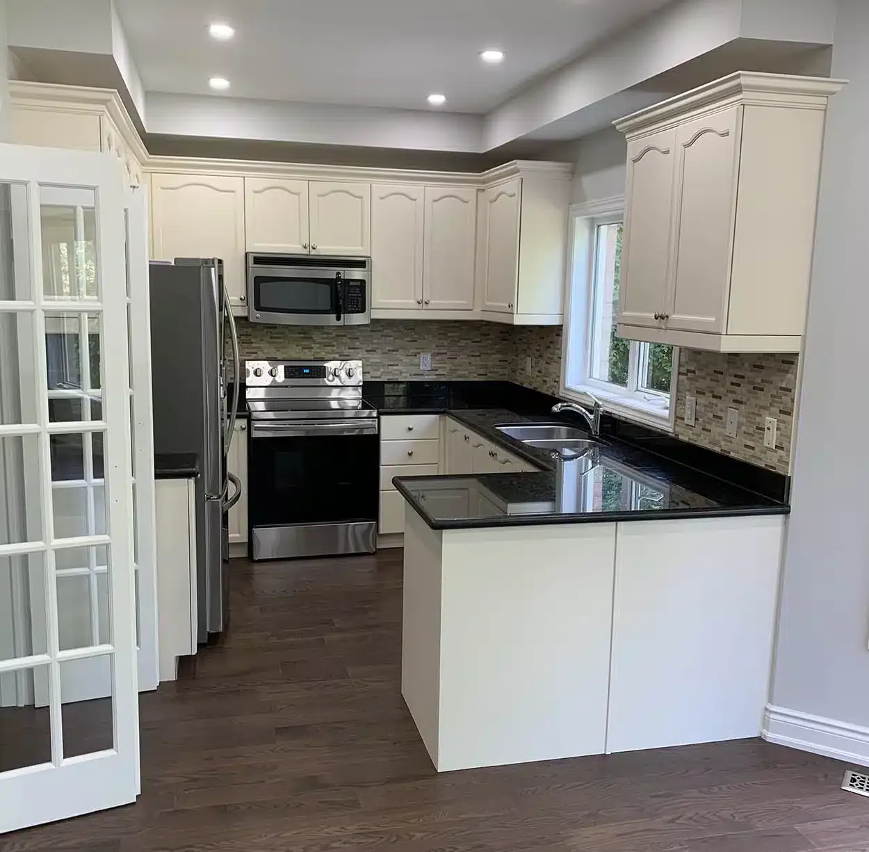 After — bright, modern kitchen repaint in Caledon