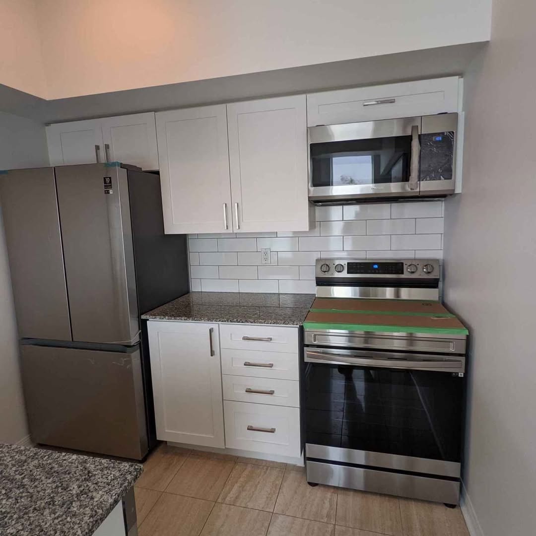 Condo kitchen after interior painting and updates