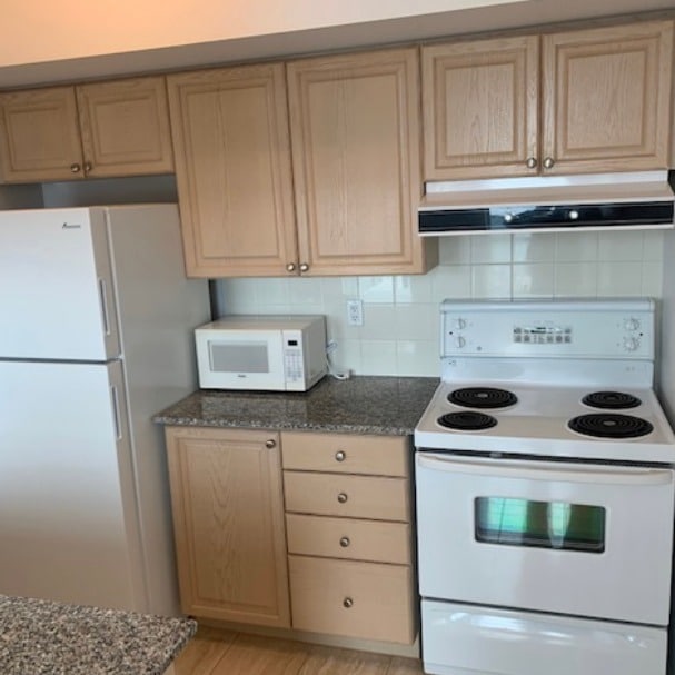 Condo kitchen before interior painting and updates