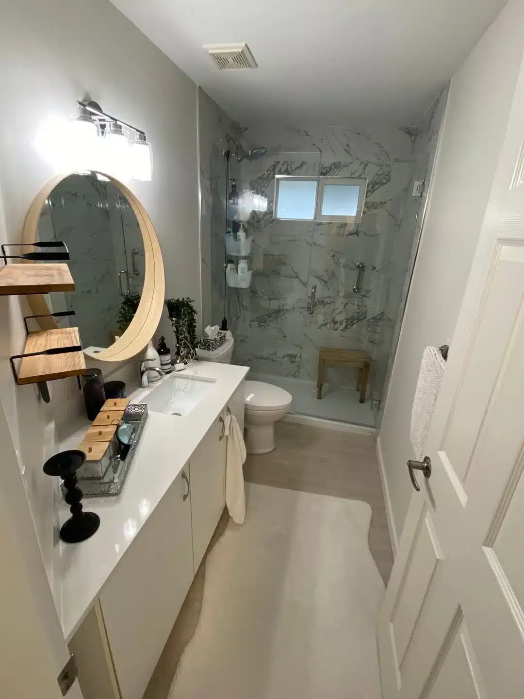 Bathroom after — fresh paint and new shower install