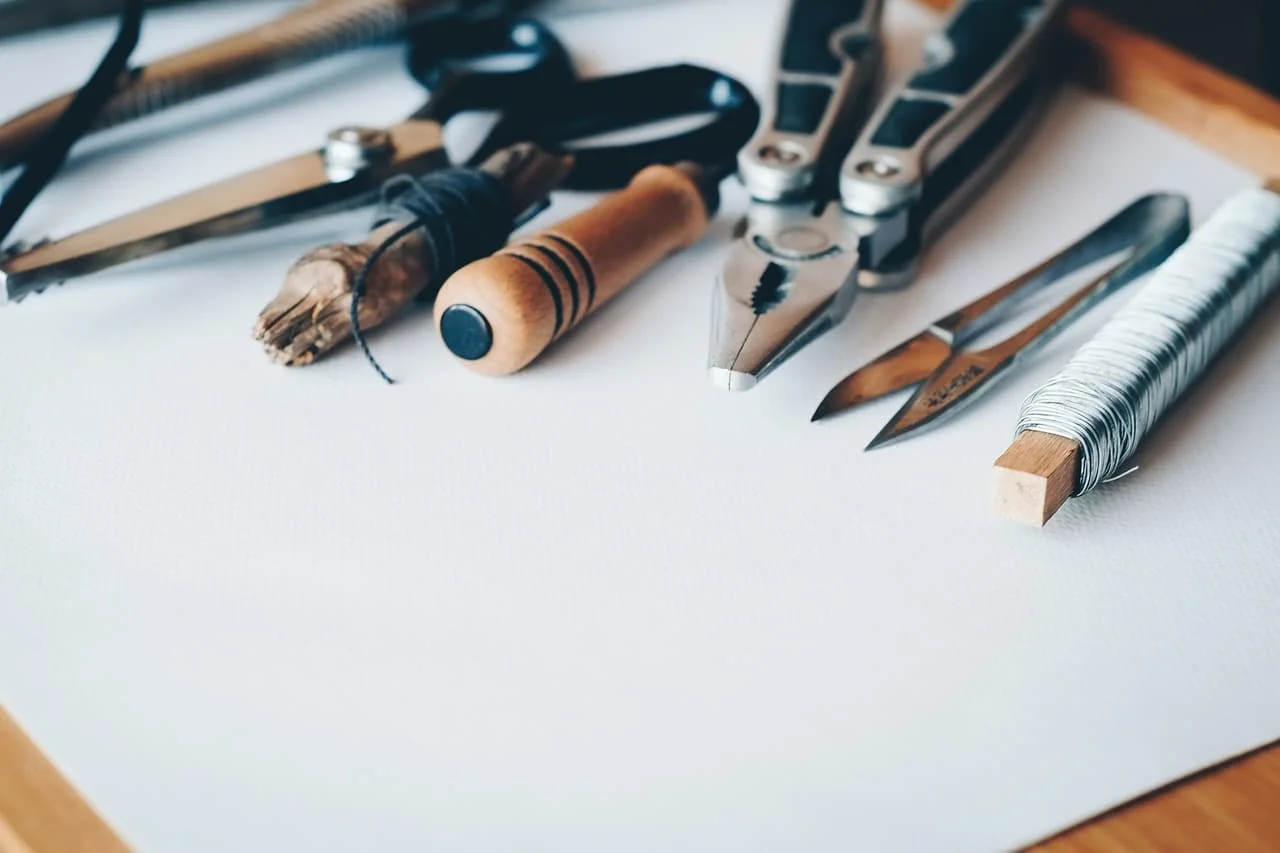 A set of hand tools laid out for home renovation work